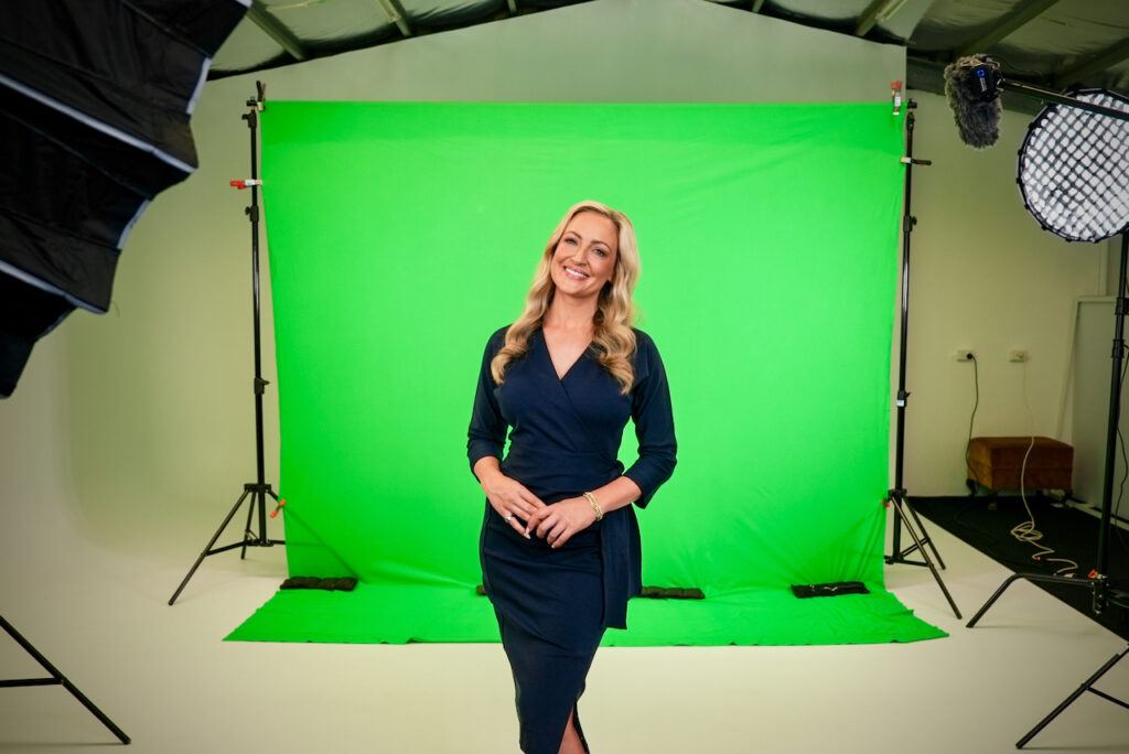 Event video production company Adelaide — presenter recorded in a polished studio setup.